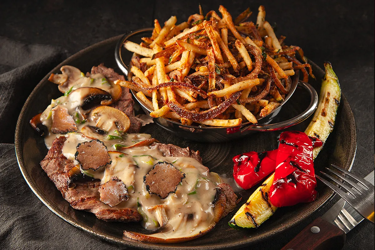Veau PACINI aux champignons et truffes, plat raffiné et parfumé