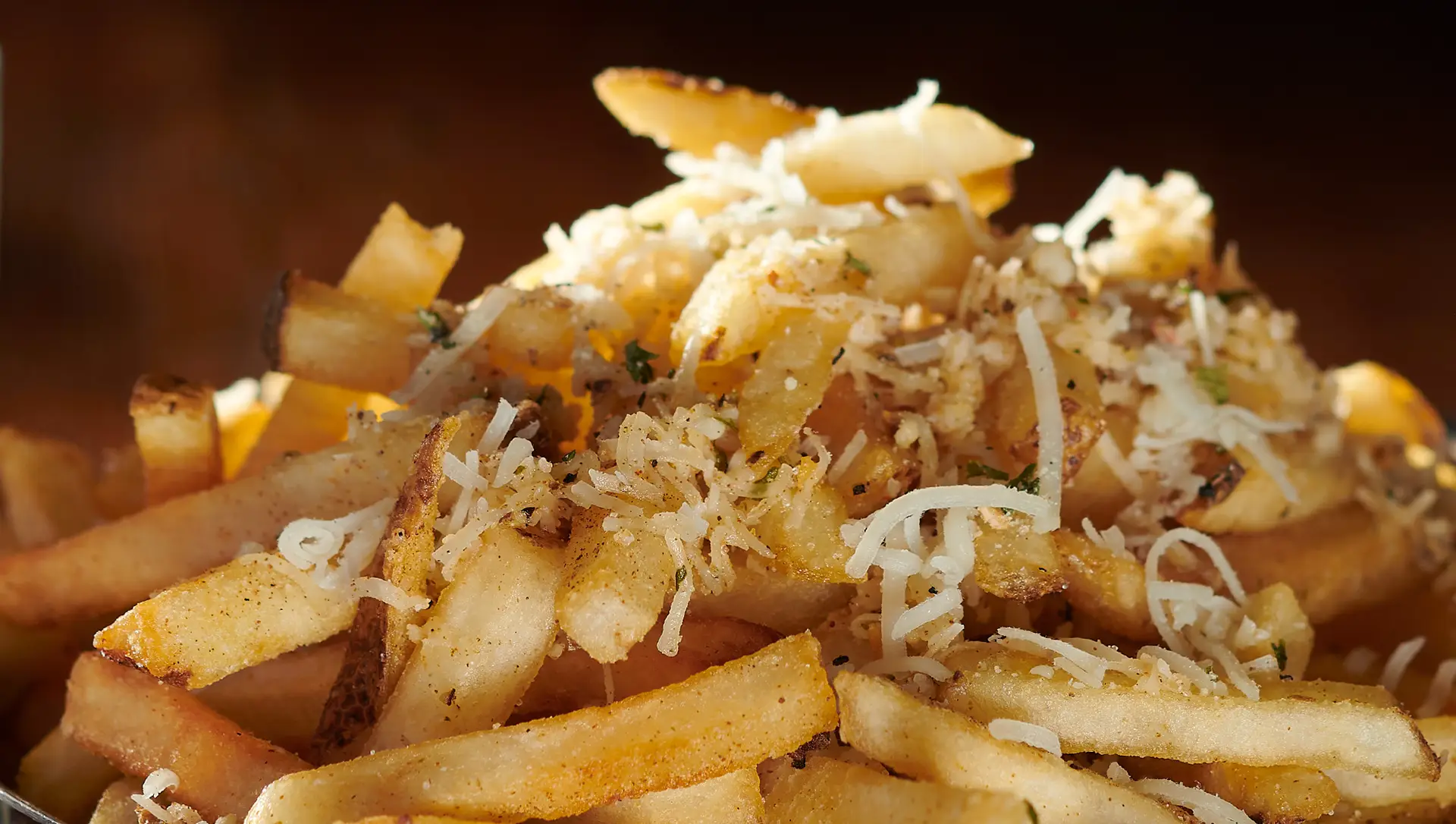 Frites parmigiana et truffe PACINI garnies de fromage et parfumées à la truffe