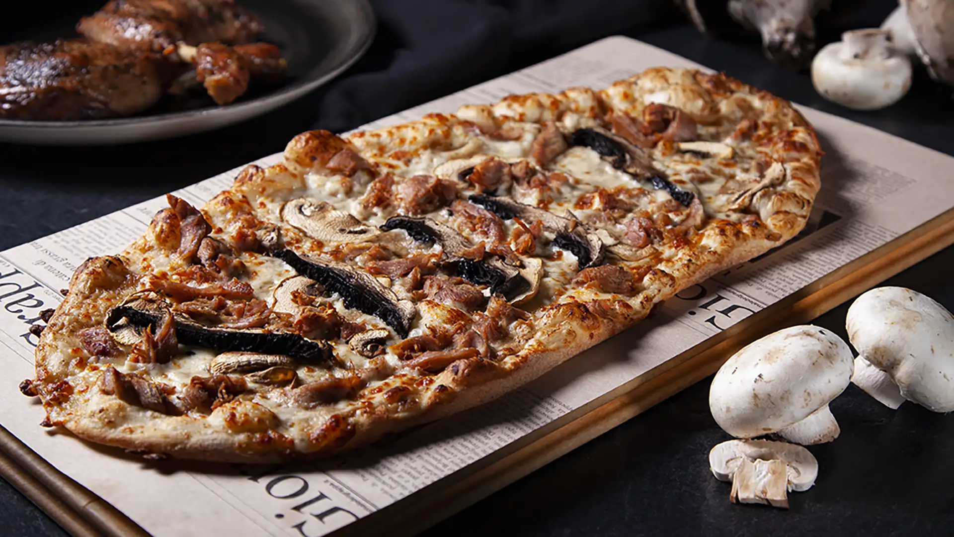 Pizza canard et champignons PACINI, pizza signature aux saveurs riches et automnales
