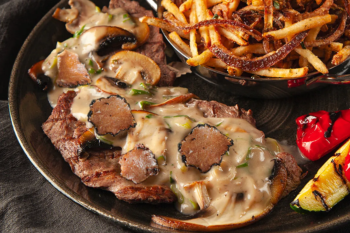 Veau PACINI aux champignons et truffes, plat raffiné et parfumé